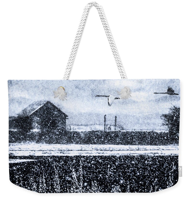 Winter Weekender Tote Bag featuring the digital art Winter Swans by Ken Taylor