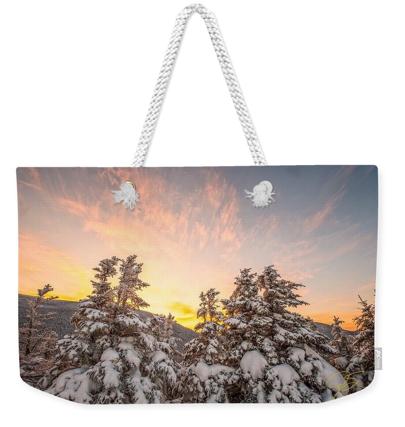 Snow Weekender Tote Bag featuring the photograph Winter's Last Light, by Jeff Sinon