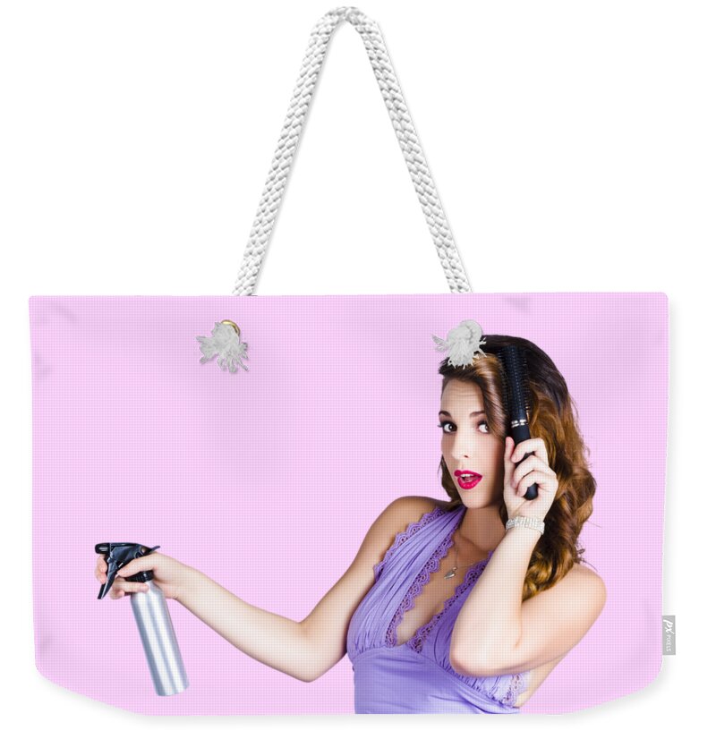Hairdresser Weekender Tote Bag featuring the photograph Woman brushing her hair by Jorgo Photography