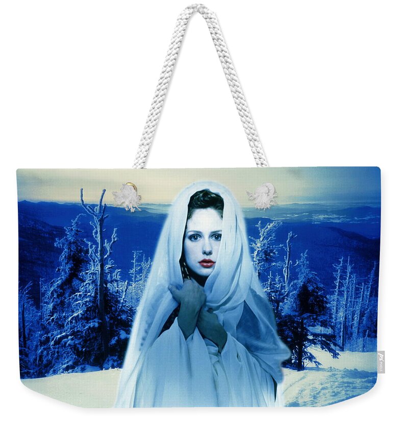 People Weekender Tote Bag featuring the photograph Woman Wearing Hooded Cape In Winter by Dennis Galante