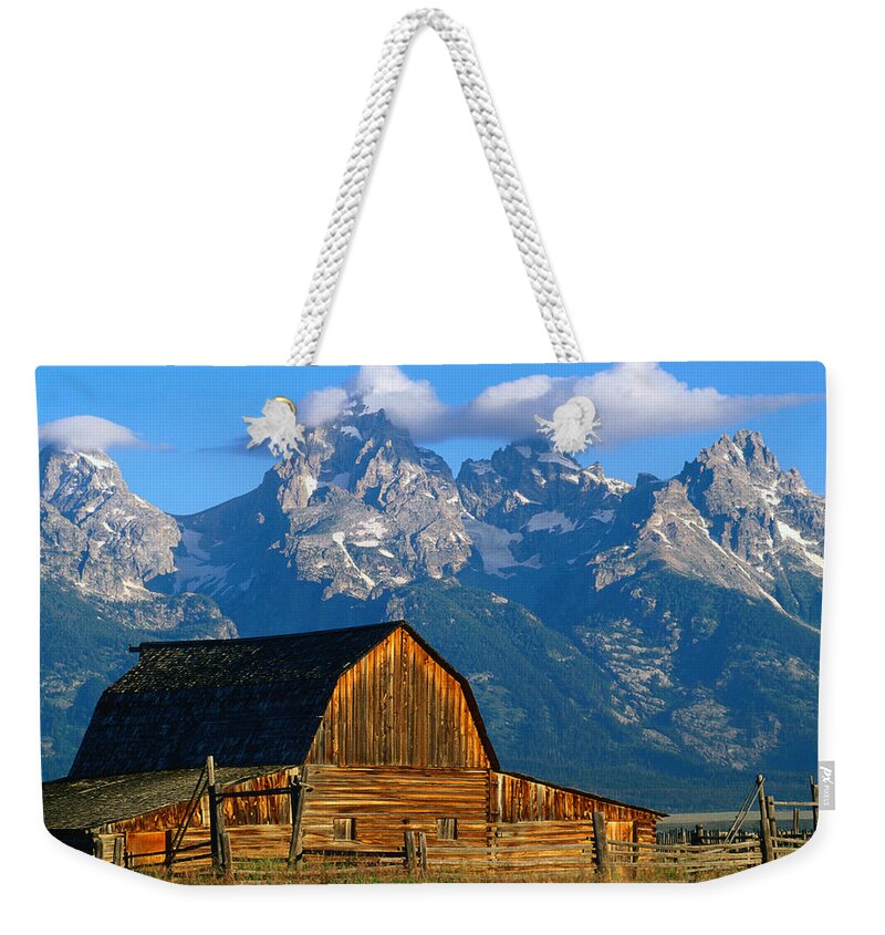 Snow Weekender Tote Bag featuring the photograph Wooden Mormon Row Barn With Teton Range by John Elk Iii