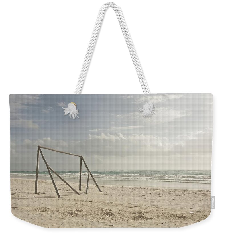 Outdoors Weekender Tote Bag featuring the photograph Wooden Soccer Net On Beach by Bailey