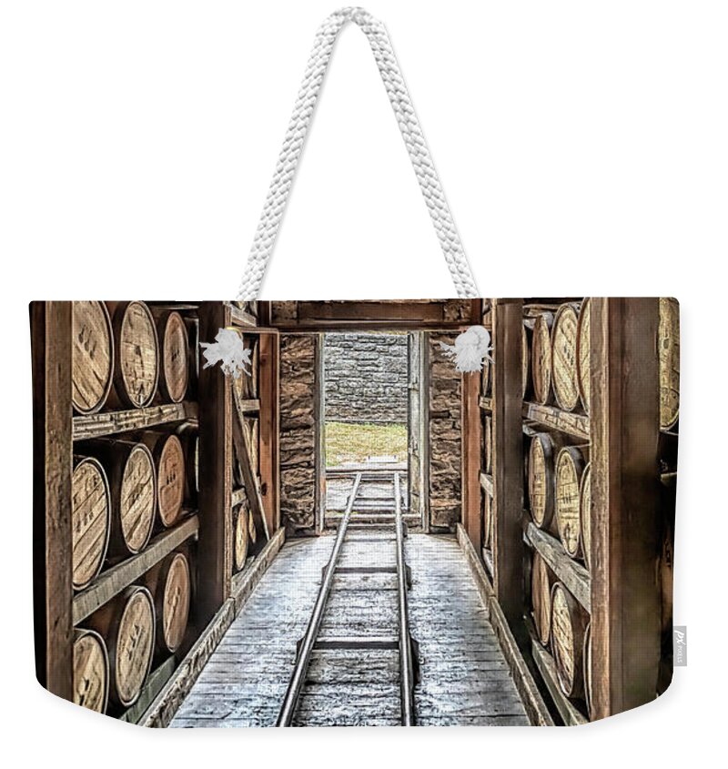 Woodford Reserve Weekender Tote Bag featuring the photograph Woodford Reserve Rickhouse by Susan Rissi Tregoning