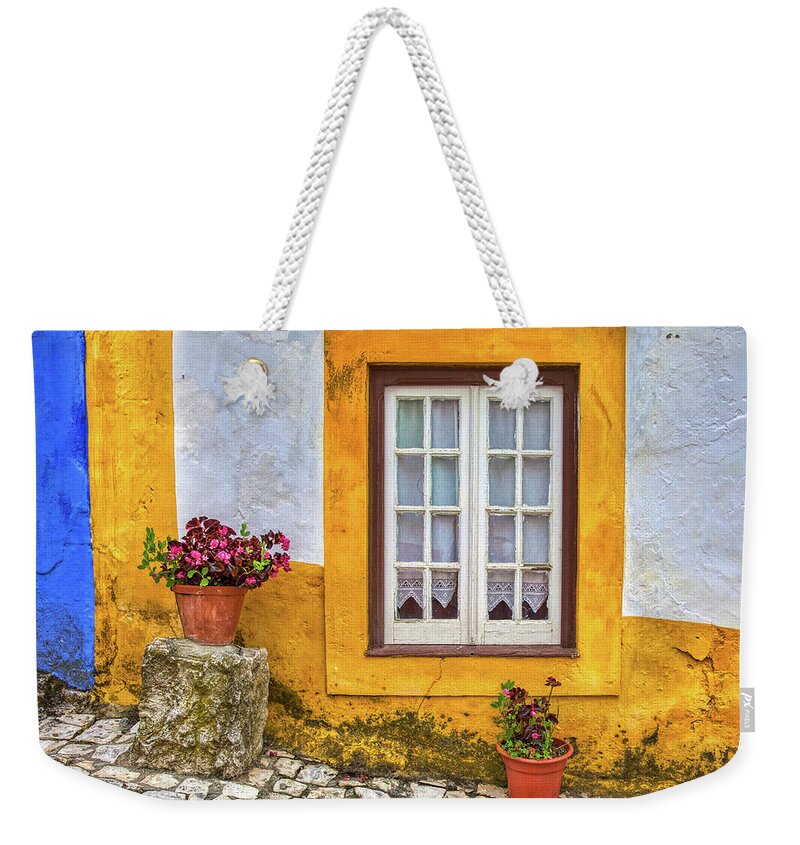 Window Weekender Tote Bag featuring the photograph Yellow Window of Obidos by David Letts