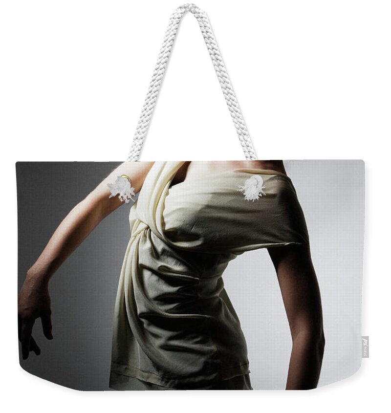 Ballet Dancer Weekender Tote Bag featuring the photograph Young Woman Performing Dance by Win-initiative/neleman