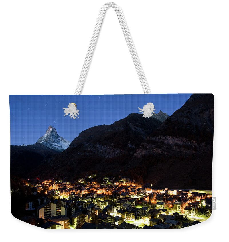 Pennine Alps Weekender Tote Bag featuring the photograph Zermatt And Matterhorn At Dusk by Jasonmooy
