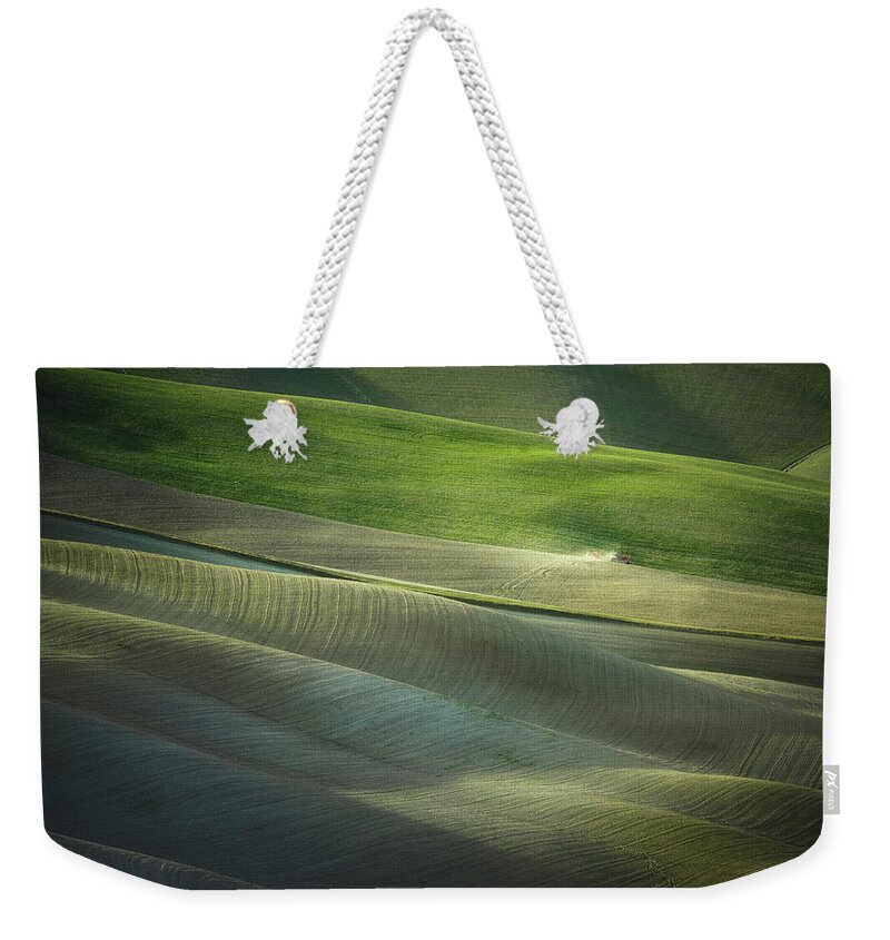 Plowing Weekender Tote Bag featuring the photograph Abstract landscape in Tuscany #1 by Stefano Orazzini