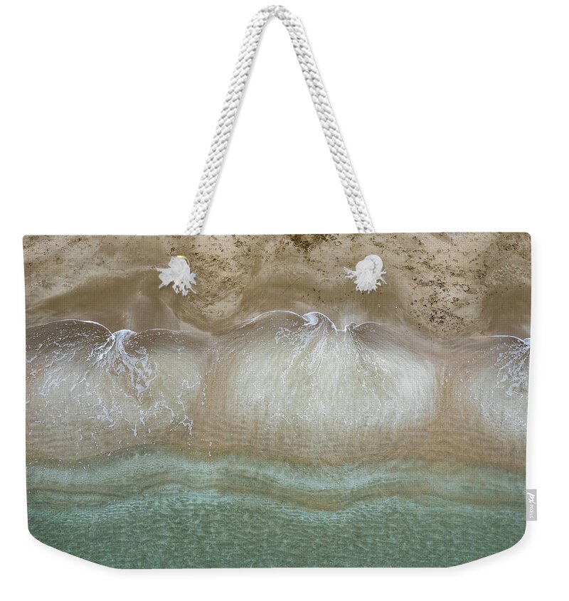 Golden Sand Weekender Tote Bag featuring the photograph Aerial view drone of empty tropical sandy beach with golden sand. Seascape background by Michalakis Ppalis