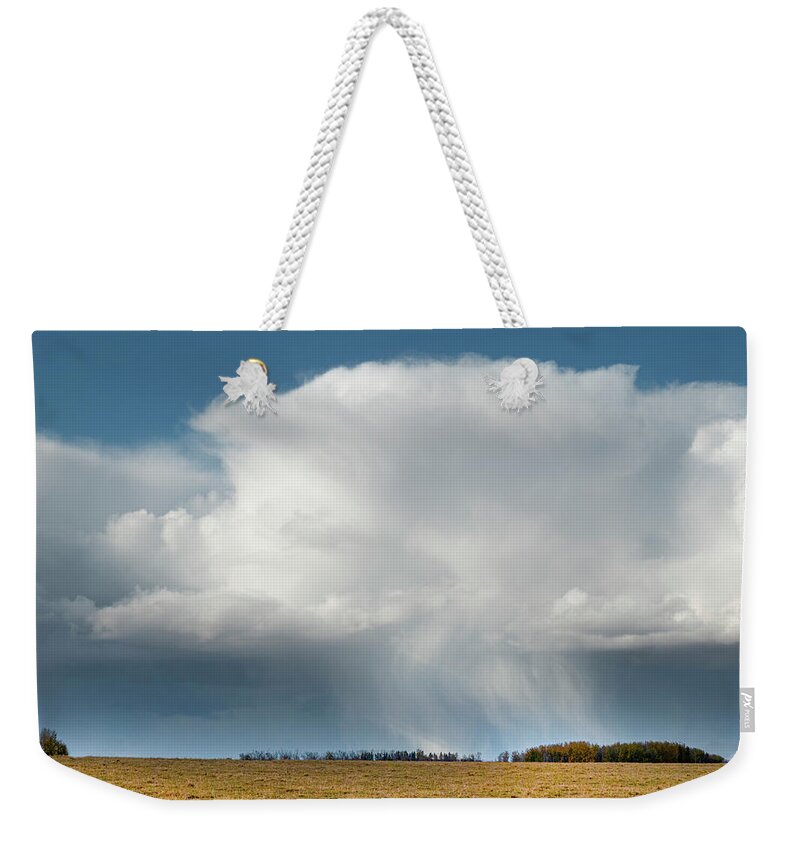Storm Weekender Tote Bag featuring the photograph Alberta prairie storm by Karen Rispin