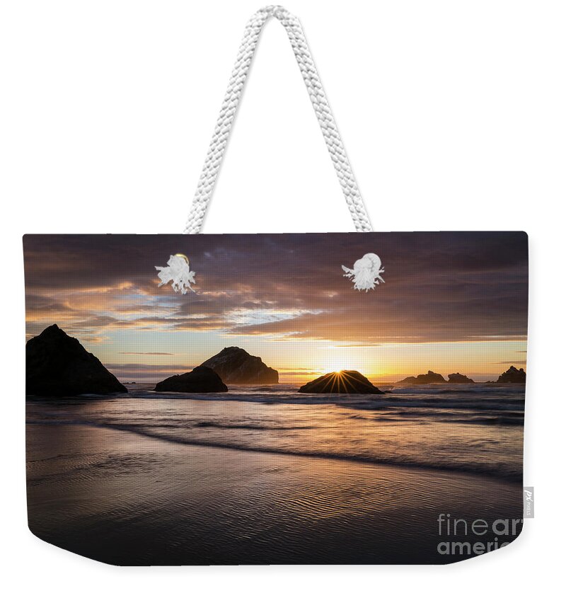 Bandon Beach Weekender Tote Bag featuring the photograph Bandon Sun Burst at Sunset by Keith Kapple