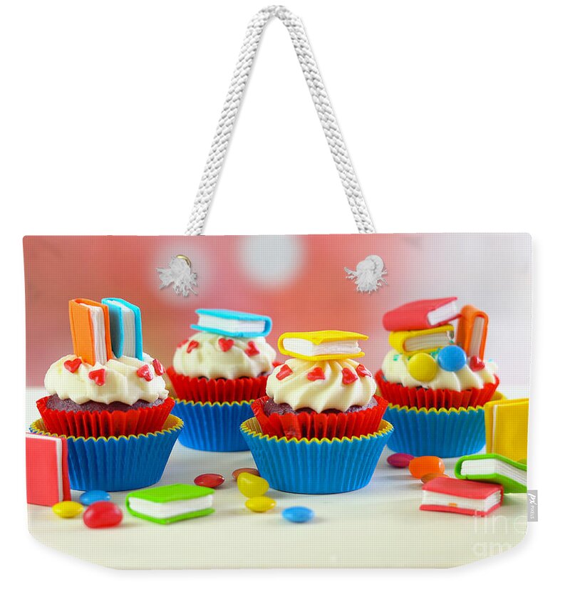 Back To School Weekender Tote Bag featuring the photograph Bright colorful Back to School theme cupcakes. #1 by Milleflore Images