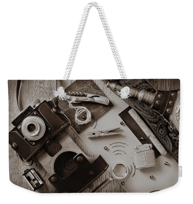 Accessory Weekender Tote Bag featuring the photograph Close up of the collection of vintage style objects by Severija Kirilovaite
