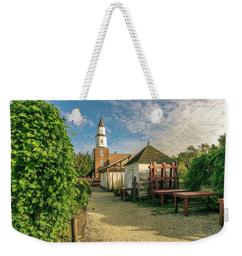 Colonial Williamsburg Weekender Tote Bag featuring the photograph Colonial Garden Scene #1 by Rachel Morrison