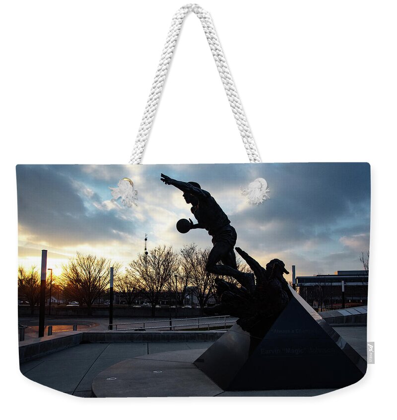 Msu Spartans Weekender Tote Bag featuring the photograph Earvin Magic Johnson statue at sunset at Michigan State University by Eldon McGraw