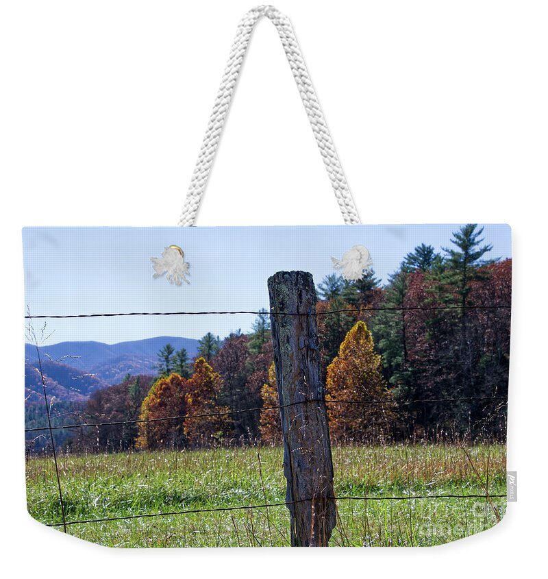 Cades Cove Weekender Tote Bag featuring the photograph Fence Post #1 by Phil Perkins