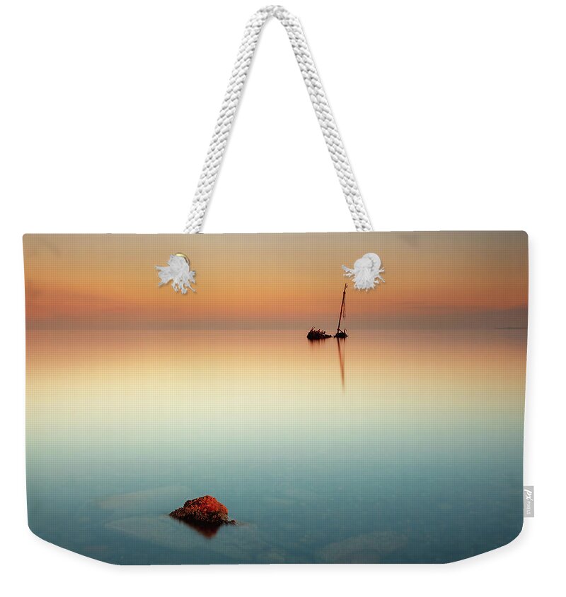 Shipwreck Weekender Tote Bag featuring the photograph Flat calm shipwreck by Grant Glendinning