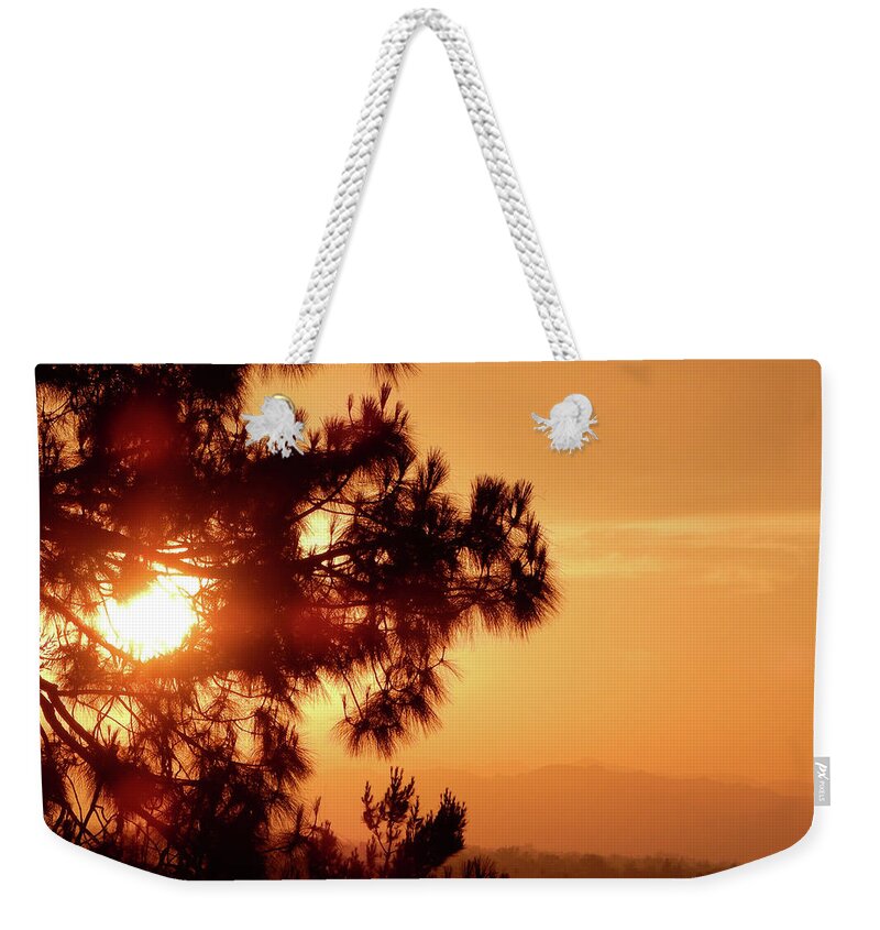 Luck Weekender Tote Bag featuring the photograph Lucky Sunset by Andrew Lawrence