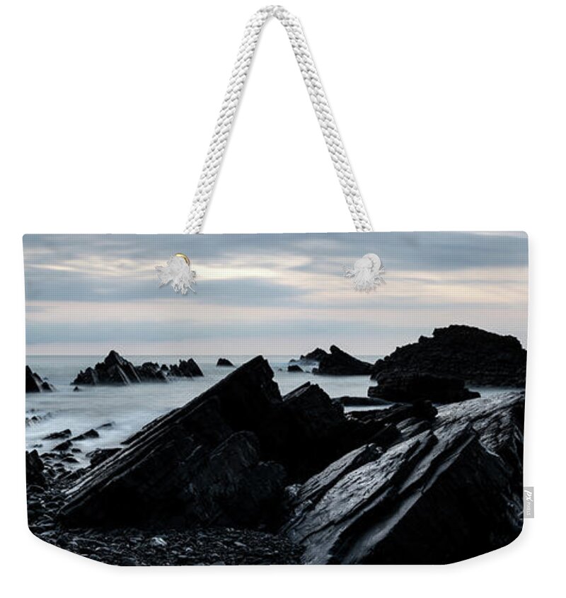 Coast Weekender Tote Bag featuring the photograph Hartland Quay North Devon south west coast path blue hour #1 by Sonny Ryse