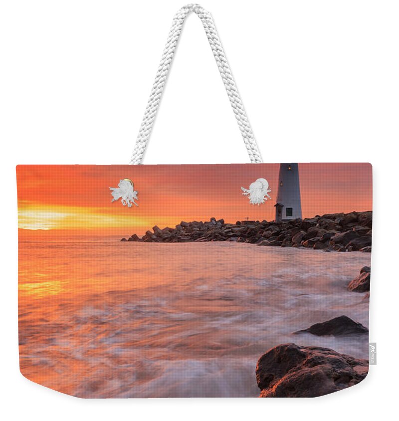 Lighthouse Weekender Tote Bag featuring the photograph House of the rising sun #1 by Erick Castellon