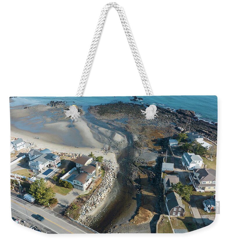 Weekender Tote Bag featuring the photograph Lizzie Carr remnants by John Gisis