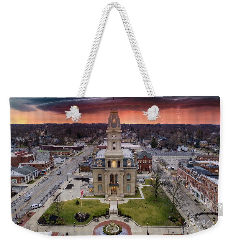  Weekender Tote Bag featuring the photograph Logan County Courthouse #1 by Brian Jones