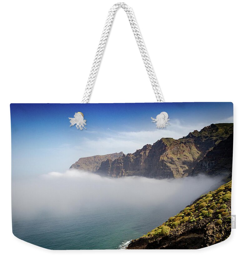 Fog Weekender Tote Bag featuring the photograph Los Gigantes #1 by Gavin Lewis