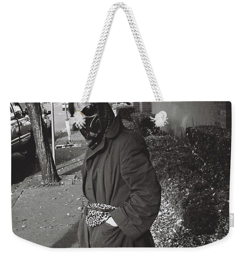 Street Photography Weekender Tote Bag featuring the photograph Masked #1 by Chriss Pagani