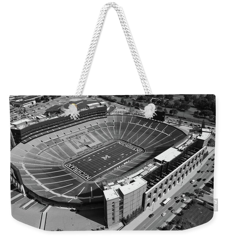 Michigan Football Weekender Tote Bag featuring the photograph Michigan Stadium overhead in black and white #1 by Eldon McGraw