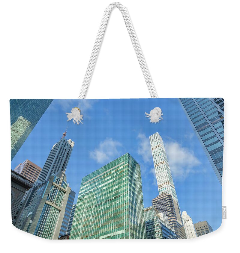 Midtown Manhattan Weekender Tote Bag featuring the photograph Midtown Skyline #1 by Cate Franklyn