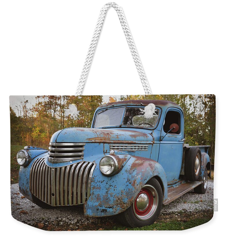 Old Chevy Weekender Tote Bag featuring the photograph Old Chevy #1 by Michelle Wittensoldner