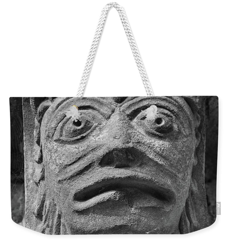 Romanesque Weekender Tote Bag featuring the sculpture The Stone Bestiary - Photo of Norman Romanesque relief sculptures from Kilpec #3 by Paul E Williams
