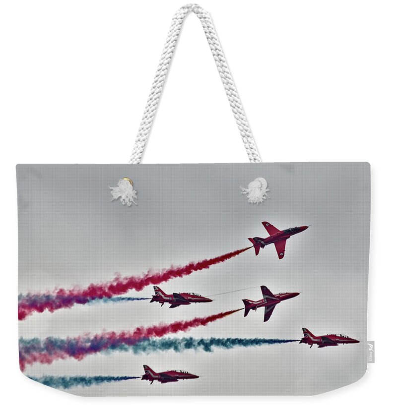 Red Arrows Weekender Tote Bag featuring the photograph Red Arrows Display #1 by Jeremy Hayden