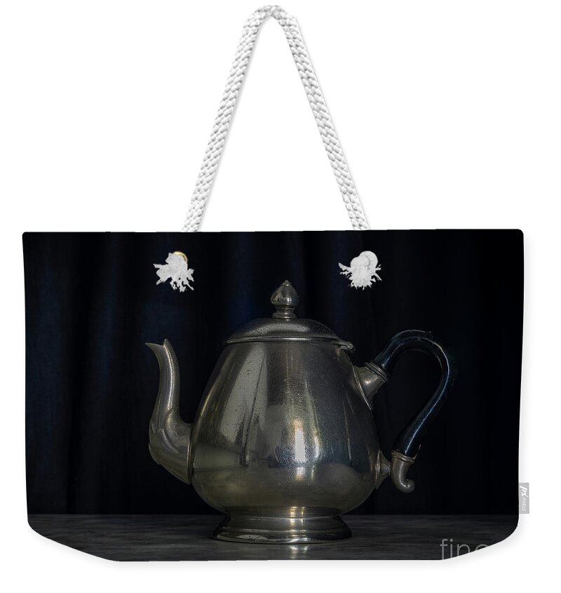 Past Weekender Tote Bag featuring the photograph Silver and Brass Teapots Black Background Marble Table #1 by Pablo Avanzini
