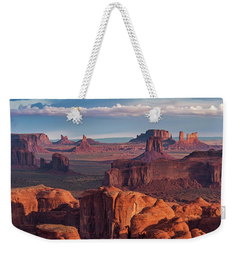 Southwest Desert Arizona Monument Valley Dineh Sunrise Stagecoach Red Rock Colorado Plateau Weekender Tote Bag featuring the photograph Sunrise from Hunt's Mesa by Dan Norris