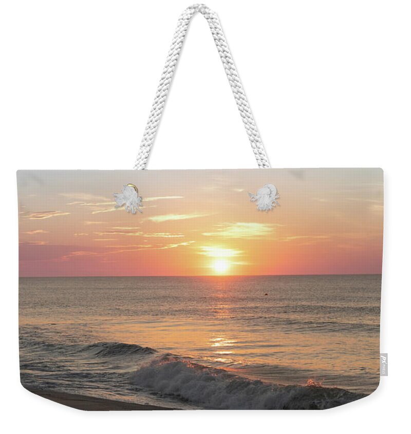 Beach Weekender Tote Bag featuring the photograph Sunrise Reflections Over the Ocean #1 by Matthew DeGrushe