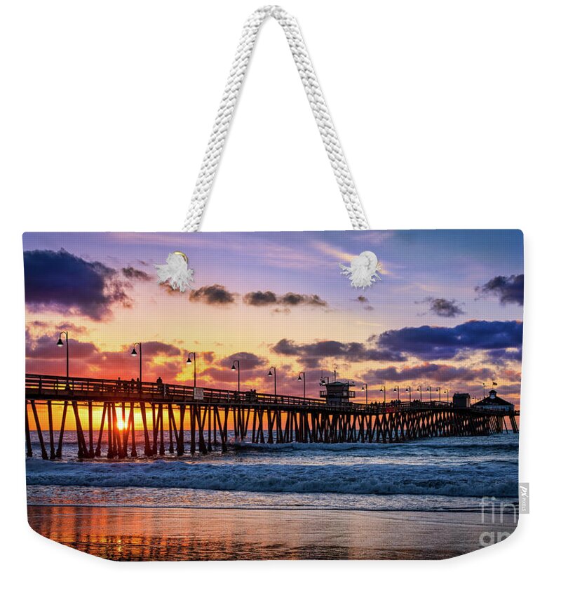 Beach Weekender Tote Bag featuring the photograph What Lights a Pier at Sunset by David Levin