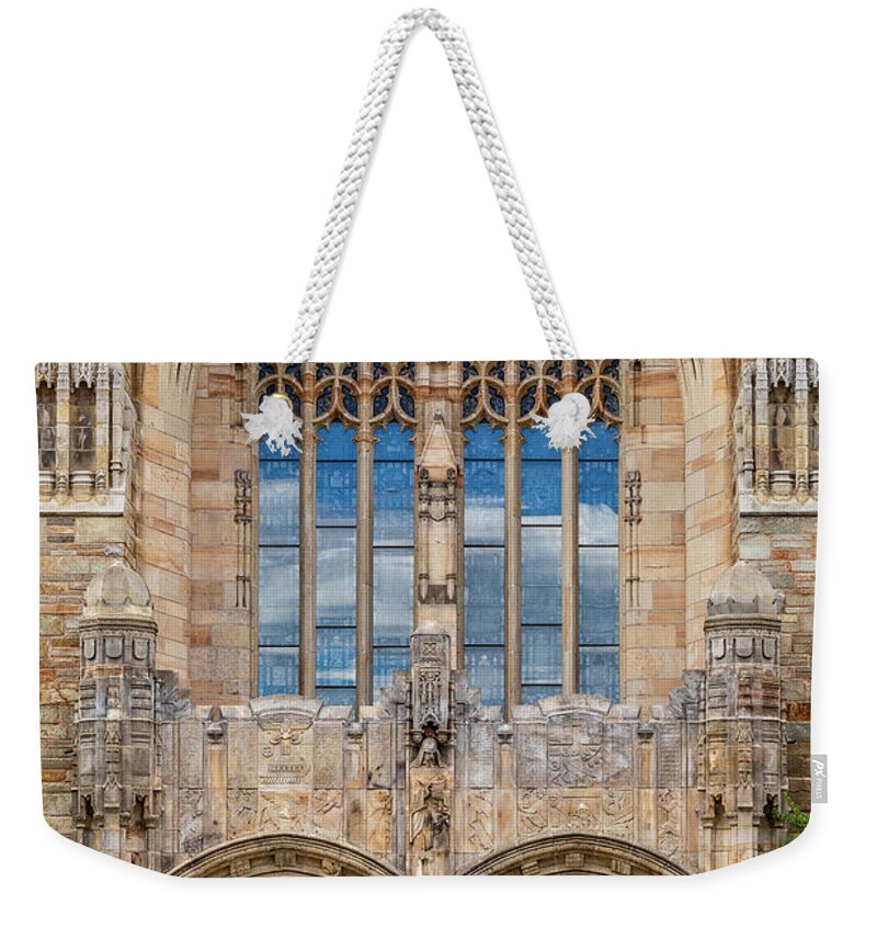 Yale Weekender Tote Bag featuring the photograph Yale University Sterling Library II by Susan Candelario