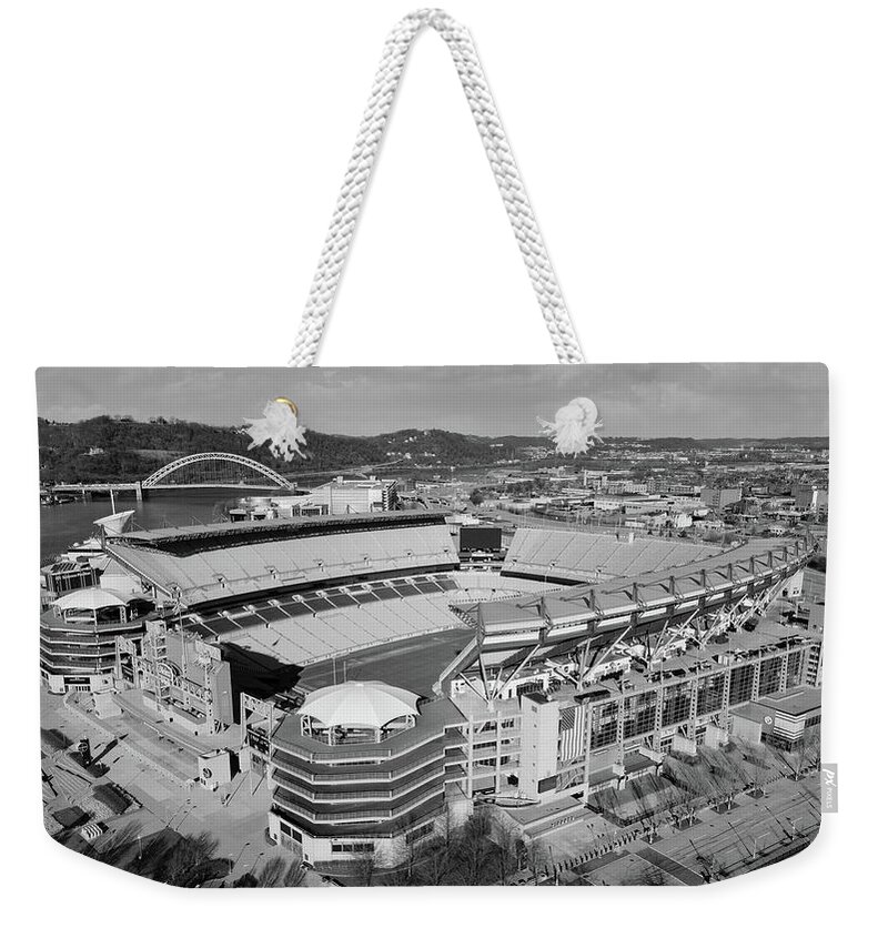 Pittsburgh Steelers Weekender Tote Bag featuring the photograph Pittsburgh Steelers Heinz Field in Pittsburgh Pennsylvania in black and white #11 by Eldon McGraw