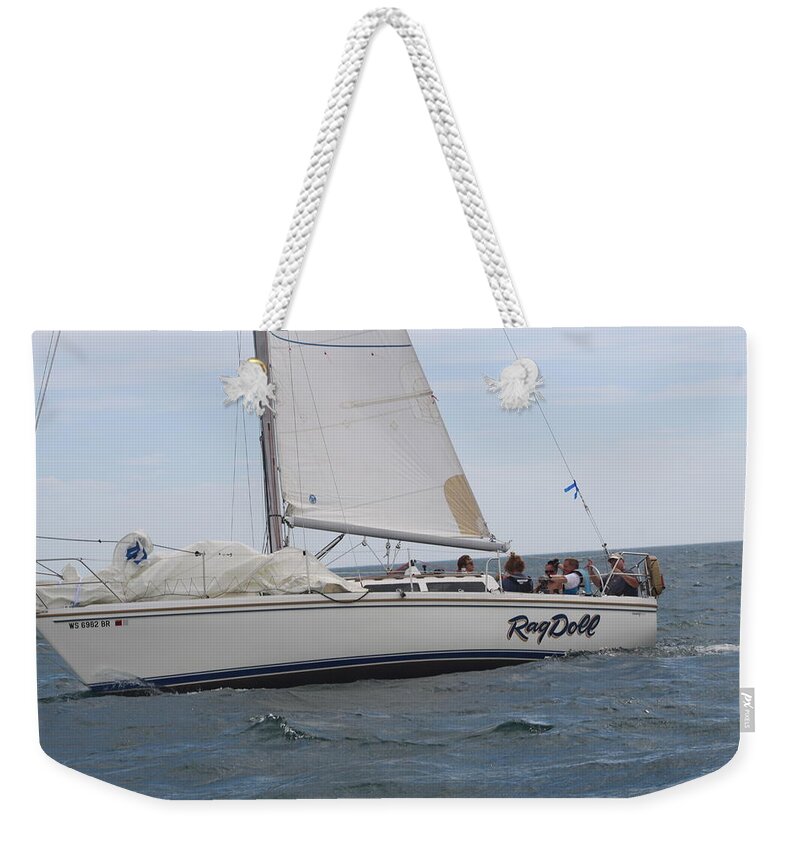  Weekender Tote Bag featuring the photograph The race #110 by Jean Wolfrum