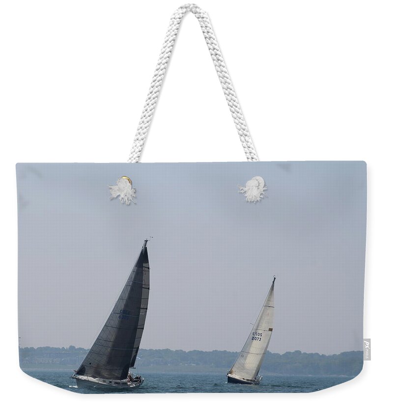  Weekender Tote Bag featuring the photograph The race #158 by Jean Wolfrum