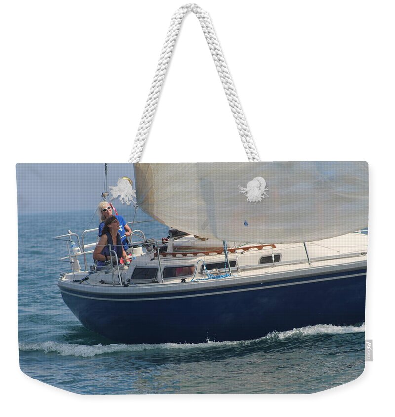  Weekender Tote Bag featuring the photograph The race #176 by Jean Wolfrum