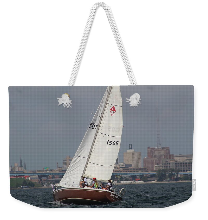  Weekender Tote Bag featuring the photograph The race #186 by Jean Wolfrum