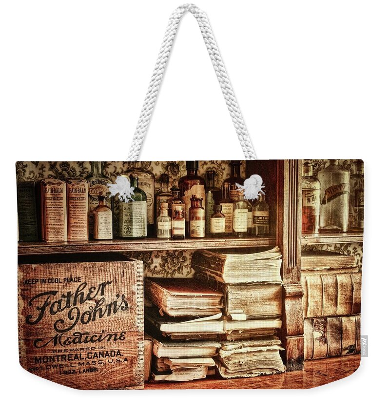 Sherbrooke Weekender Tote Bag featuring the photograph 18th Century Pharmacy by Tatiana Travelways