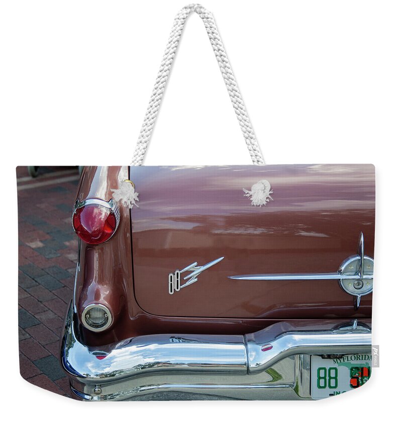 1956 Oldsmobile Super 88 Coupe Weekender Tote Bag featuring the photograph 1956 Oldsmobile Super 88 Coupe 110 100 by Rich Franco