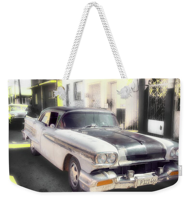 Old Car Weekender Tote Bag featuring the photograph 1958 Oldsmobile Super 88 by Micah Offman