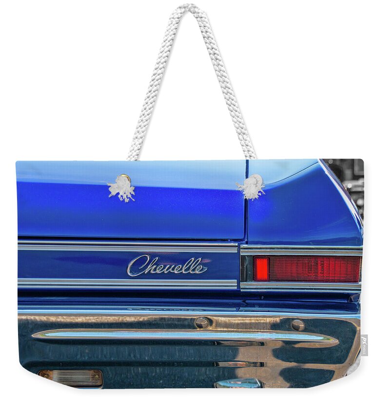 1968 Weekender Tote Bag featuring the photograph 1968 Chevy Chevelle Tail Light by Kristia Adams