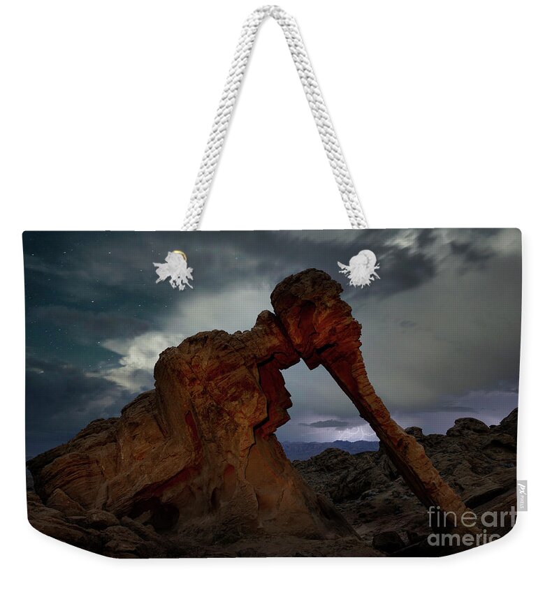 Thunder Storm; Milky Way; Star Trails; Night Photography; Light Painting; Desert Landscapes; Desert Southwest; Geology; Astrophotography; Elephant Rock; Landmark; Historical Landmark; Tranquil Scene; Travel Destinations; Usa; Ancient; Stone; Night; Color Image; Night Photography; Valley Of Fire; Nevada Weekender Tote Bag featuring the photograph Elephant Rock #2 by Keith Kapple