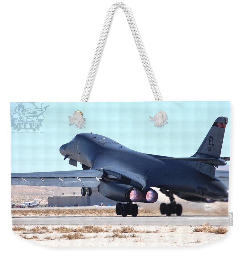 B-1b Weekender Tote Bag featuring the photograph Ellsworth based B-1B Lancer 86-0111 launching from 03R Nellis AFB #2 by Custom Aviation Art