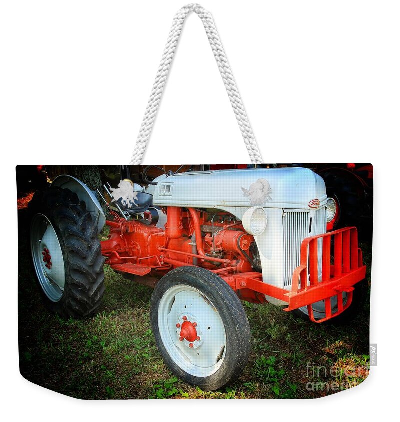 Ford Tractor Weekender Tote Bag featuring the photograph Ford Tractor #2 by Mike Eingle