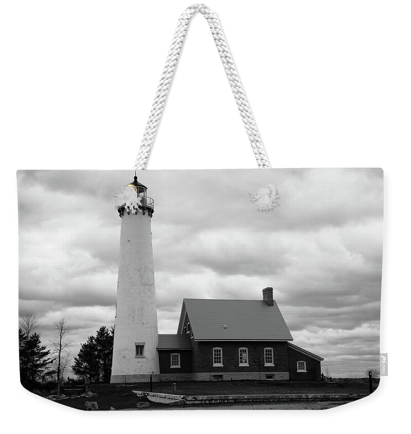 America Weekender Tote Bag featuring the photograph Lighthouse - Tawas Point Michigan #1 by Frank Romeo